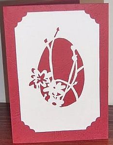 Hand-made cut greeting card with Egg with flowers