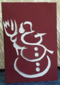 Handmade greeting card with Snowman wit a broom