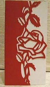 Hand-made cut greeting card with rose with leaves